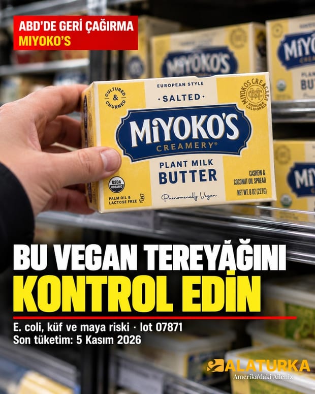 ABD'de geri çağrılan Miyoko's bitkisel tereyağı paketini market rafından alan el